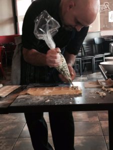 Sal Zappone leading cooking class, corporate team building event